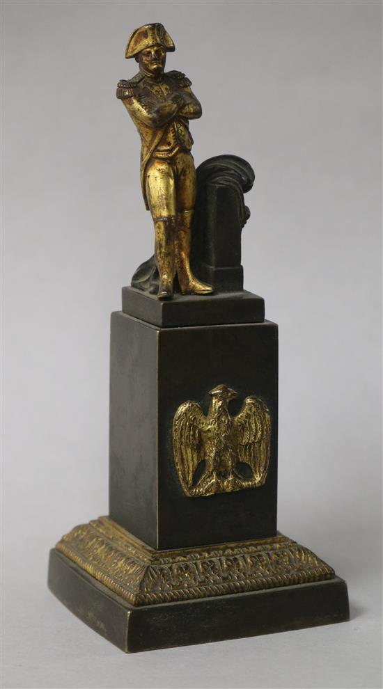 A French bronze miniature figure of Napoleon, on rectangular plinth with Imperial Eagle emblem